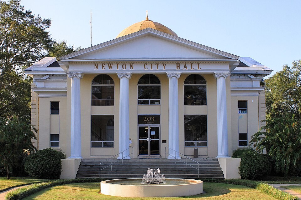 Representative city image: Newton, Mississippi; location illustration, not company equipment.
